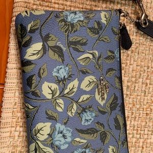 Coach floral wristlet.